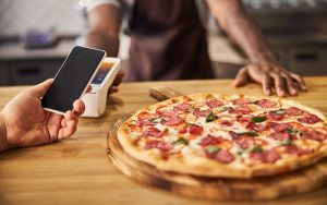 How a VoIP Phone System Can Revolutionize Your Pizza Delivery Experience